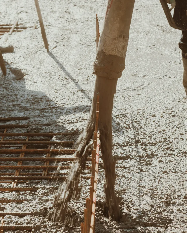 Fresh concrete being poured